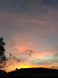 Scenic view of dramatic sky during sunset