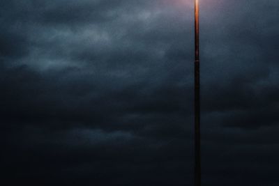 Low angle view of storm clouds at night