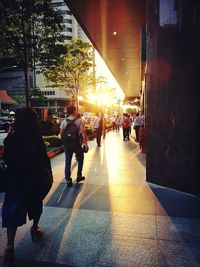 People walking on street in city