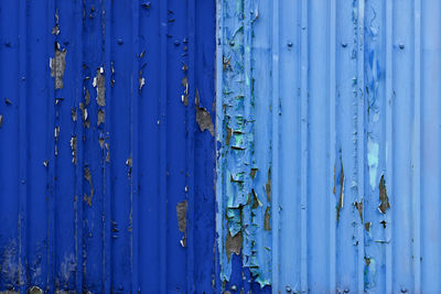 Full frame shot of weathered blue corrugated iron