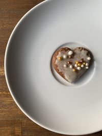 High angle view of heart shape in bowl on table