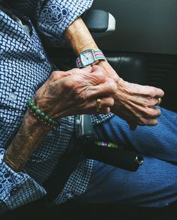 Low section of man sitting