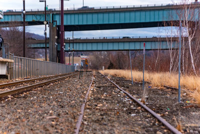 Train at railroad station against sky