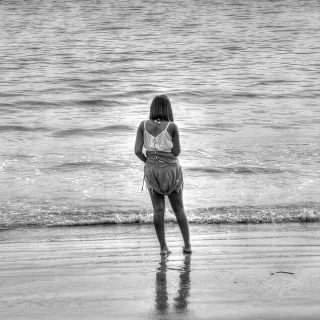 water, full length, lifestyles, sea, beach, rear view, leisure activity, shore, casual clothing, childhood, boys, walking, standing, sand, vacations, nature, togetherness