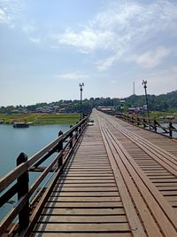 Bridge over river against sky