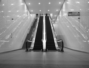 Low angle view of illuminated subway station