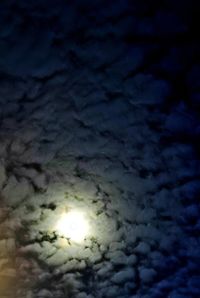 Low angle view of illuminated sky at night