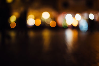 Defocused image of illuminated lights at night