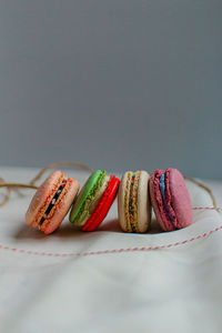 Close-up of macaroon against gray background