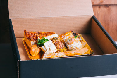 High angle view of food in box on table