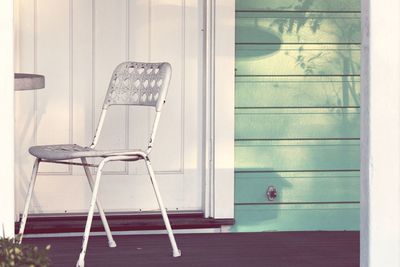 Pretty pastel retro house front with dainty shadows