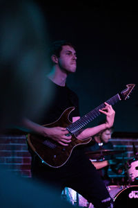 Young man playing guitar