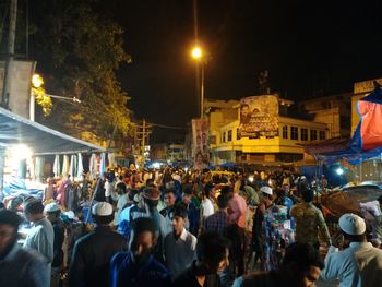 People on street at night