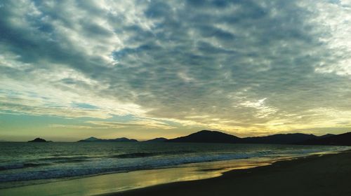 Scenic view of sea against sky at sunset