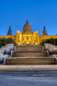 The national palace on montjuic mountain in barcelona illuminated at twilight