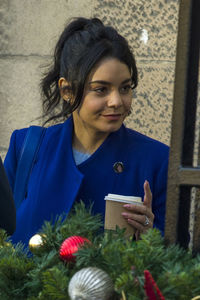 Young woman using mobile phone outdoors