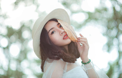 Close-up portrait of young woman