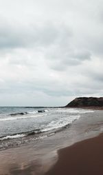 Scenic view of beach against sky