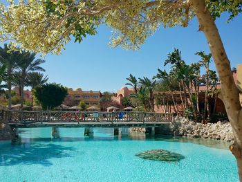 View of swimming pool against blue sky