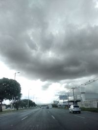 View of road against cloudy sky