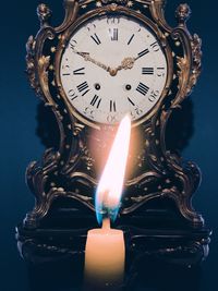 Close-up of illuminated clock