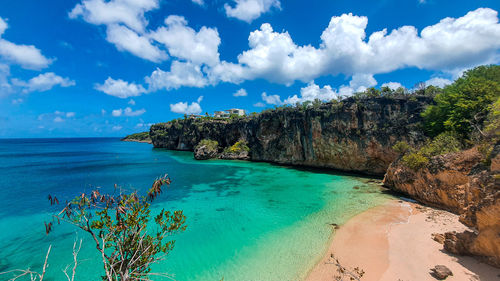 Panoramic view of bay against sky