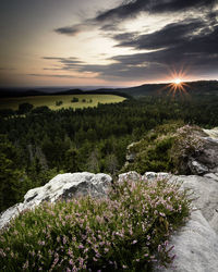 Scenic view of landscape against sky during sunset