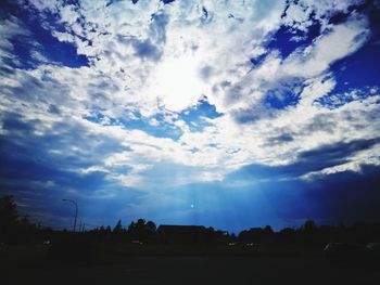 Scenic view of landscape against blue sky