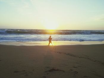 Scenic view of sea at sunset