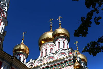 Low angle view of building against blue sky