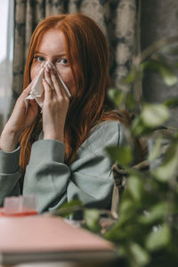First steps taken at home to monitor and manage early signs of illness, cold with a runny nose