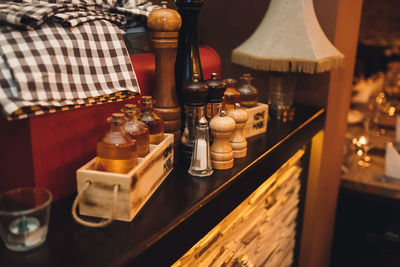 Close-up of wine bottles on table in restaurant