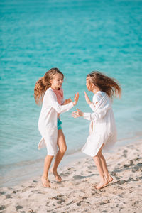 Full length of woman on beach