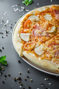 High angle view of pizza in plate on table