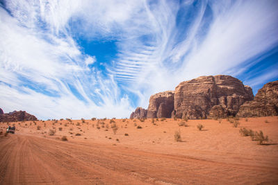 Panoramic view of desert against sky