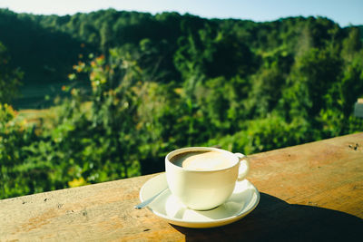 Close-up of coffee cup on table