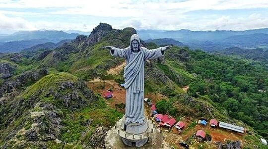 STATUE ON MOUNTAIN