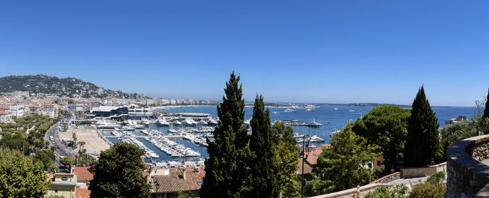 High angle shot of townscape against clear blue sky