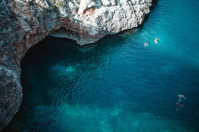 High angle view of rock formation in sea