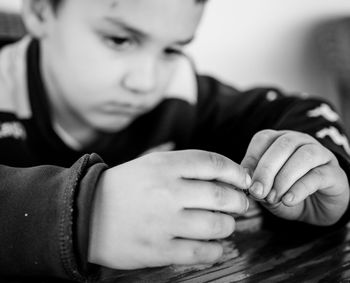 Close-up portrait of boy at home
