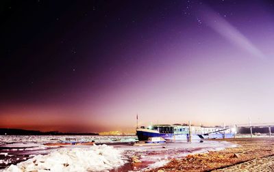 Scenic view of sea against sky at night