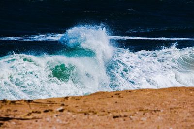 Waves splashing on shore