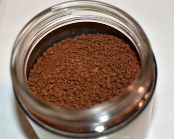 High angle view of coffee in jar on table