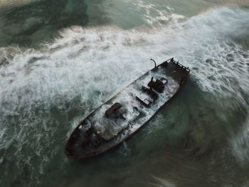 High angle view of abandoned ship in sea