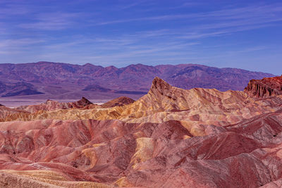 View of desert against mountain range
