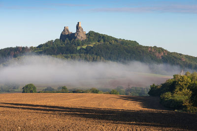 Scenic view of land against sky