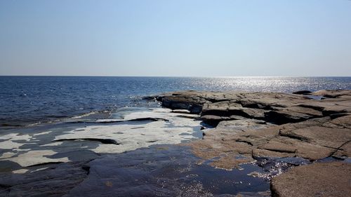 Scenic view of sea against clear sky