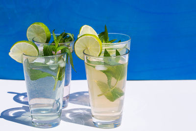 Close-up of four glasses of mojito