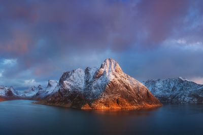 Scenic view of snowcapped mountains against sky during winter