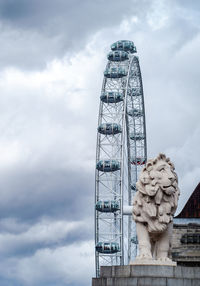 Low angle view of statue against sky